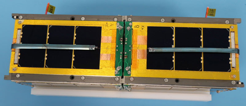 CubeSail before launch-pod integration with stowed antenna. CubeSail with Stored Antenna